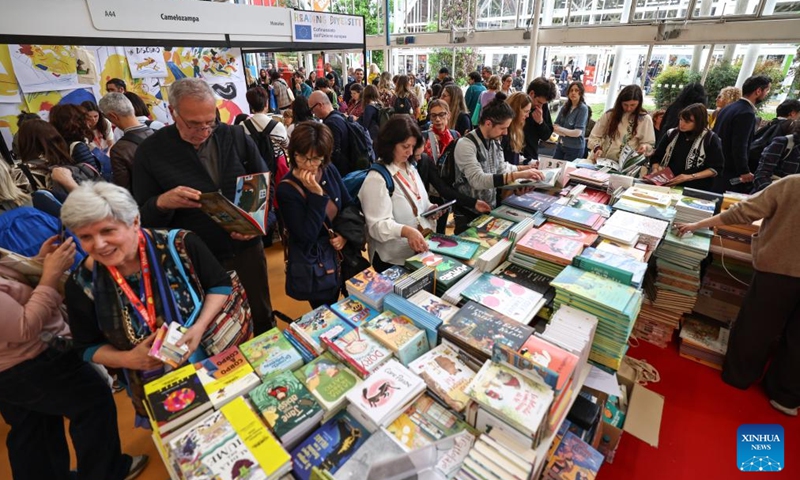 Visitors attend the 63rd Bologna Children's Book Fair in Bologna, Italy, April 13, 2026. The 63rd Bologna Children's Book Fair opened on Monday in the Italian city of Bologna. (Xinhua/Wang Kaiyan)

