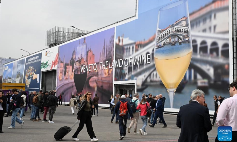 People visit the 58th international wine and spirits exhibition Vinitaly in Verona, Italy, April 13, 2026. Running from April 12 to 15 this year, the international wine and spirits exhibition Vinitaly, Italy's oldest and prestigious wine fair, attracts enterprises and professional visitors from nearly 130 countries and regions. (Photo by Alberto Lingria/Xinhua)

