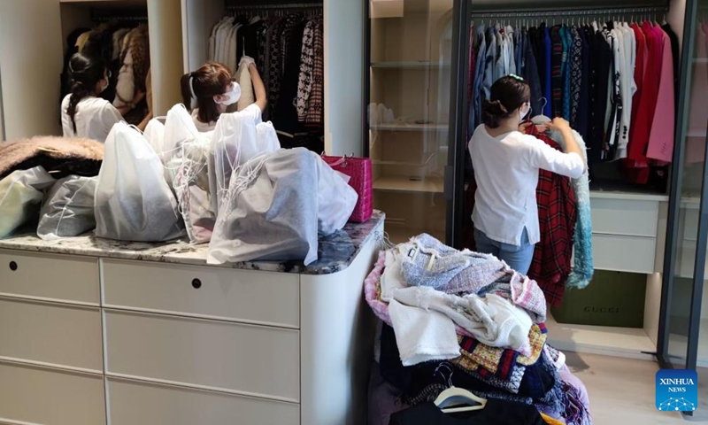 This combo photo taken in January 2026 shows a wardrobe before (above) and after Nai Dan's decluttering in Lanzhou, northwest China's Gansu Province. (Xinhua)

