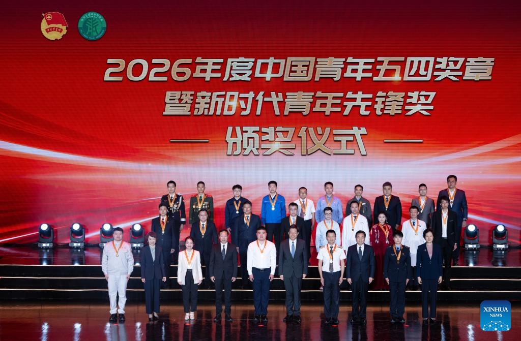Individual awardees of the 2026 China Youth May Fourth Medal pose for a group photo during the awarding ceremony in Beijing, capital of China, April 27, 2026. (Xinhua/Cai Yang)

