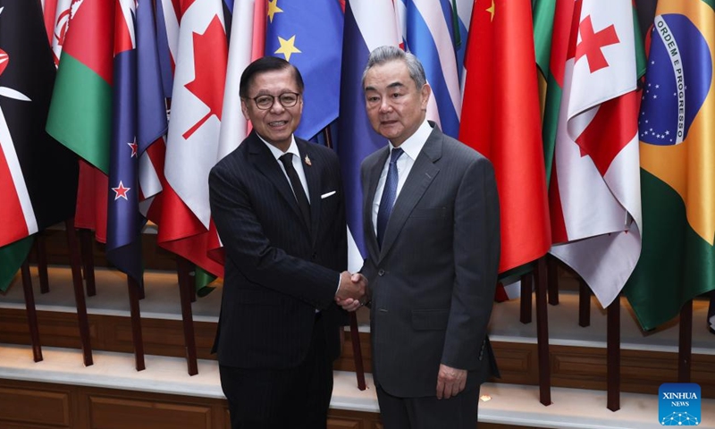 Chinese Foreign Minister Wang Yi, also a member of the Political Bureau of the Communist Party of China Central Committee, together with Sihasak Phuangketkeow, Thailand's deputy prime minister and foreign minister, held the third meeting of the Consultation Mechanism between the Ministers of Foreign Affairs of China and Thailand in Bangkok, Thailand, April 24, 2026. (Xinhua/Sun Weitong)

