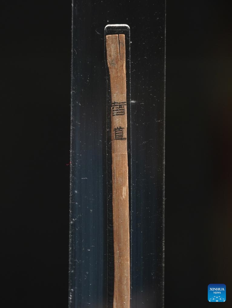 This photo taken on April 13, 2026 shows a bamboo slip written with manuscripts of a once lost chapter of The Analects of Confucius at the Nanchang Relic Museum of Haihun Marquisate of Han Dynasty in Nanchang, east China's Jiangxi Province. 
