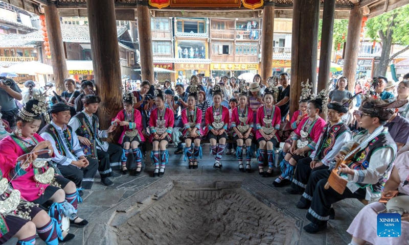 Singers perform Dong Grand Song for visitors in Zhaoxing Dong Village of Liping County, southwest China's Guizhou Province, April 19, 2026.

