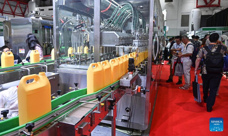 People visit PALMEX Jakarta 2026, a palm oil industry expo held in Jakarta, Indonesia, May 7, 2026. (Xinhua/Agung Kuncahya B.)


