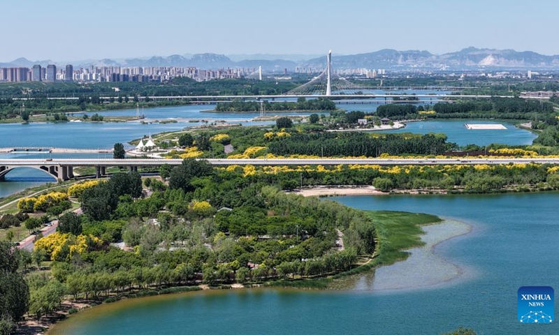 An aerial drone photo taken on May 7, 2026 shows a view along the Hutuo River in Shijiazhuang, north China's Hebei Province. (Photo by Liang Zidong/Xinhua)