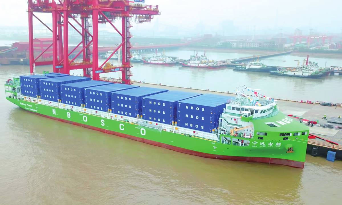 The Ningyuan Diankun, the world's largest and China's first 10,000-ton all-electric intelligent container vessel, sets sail from the Beilun port area of Ningbo Zhoushan Port for the Zhapu port area of Jiaxing Port on April 15, 2026, marking the start of its commercial operations. Photo: Courtesy of Ningbo-Zhoushan Port 