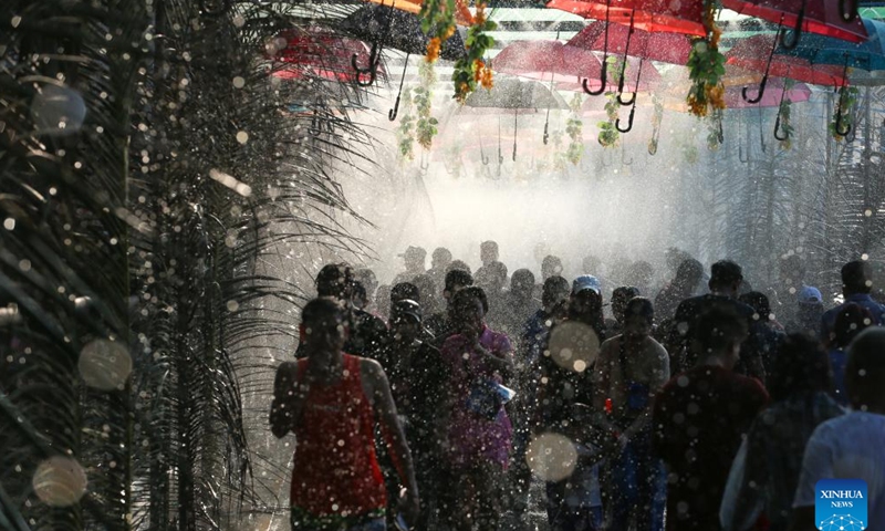 People celebrate the traditional Thingyan water festival in Yangon, Myanmar, April 14, 2026. (Xinhua/Myo Kyaw Soe)

