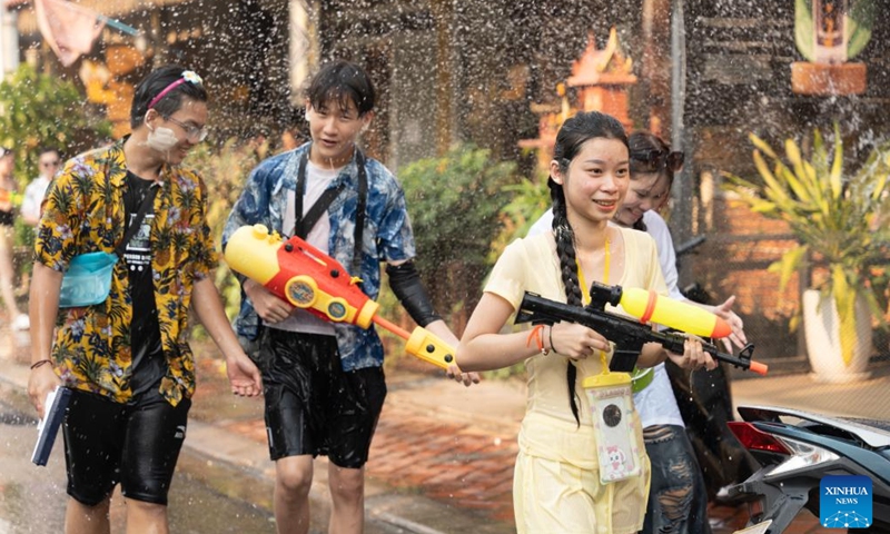 People take part in the celebration of the Lao New Year in Vientiane, Laos, April 14, 2026. (Photo by Kaikeo Saiyasane/Xinhua)

