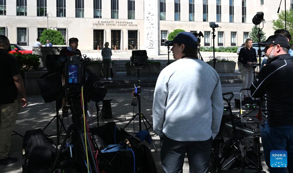 Media crews are positioned near the entrance to the U.S. District Court for the District of Columbia in Washington, D.C., the United States, April 27, 2026. (Xinhua/Li Rui)

