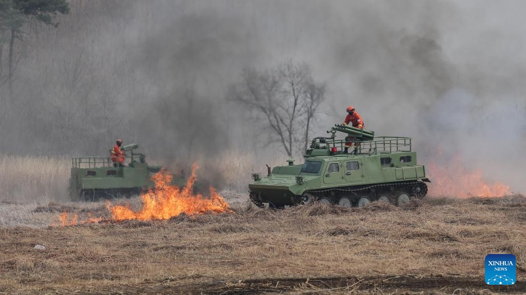 Fire extinguishing devices are seen during a fire drill in Shenyang, northeast China's Liaoning Province, April 14, 2026. The drill was conducted on Tuesday to enhance the local emergency workers' preparedness for forest fires, which are prone in spring. (Xinhua/Pan Yulong)

