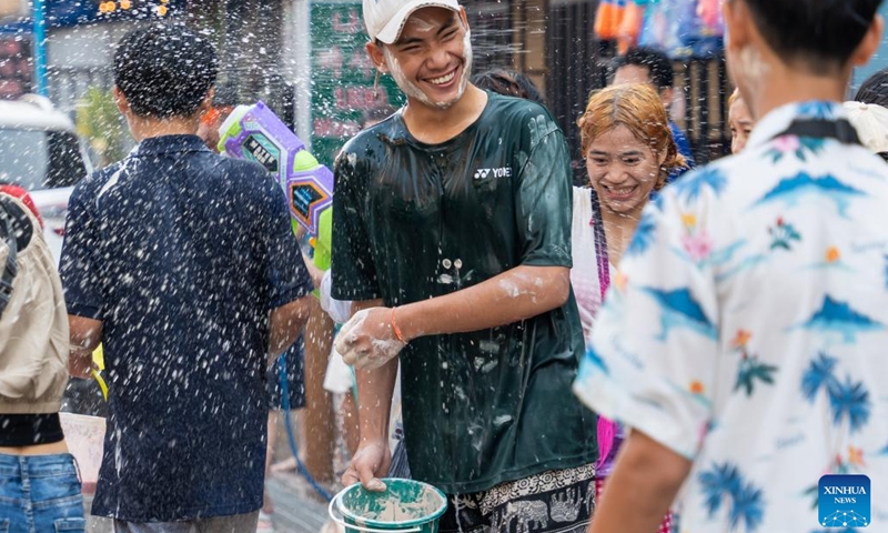 People take part in the celebration of the Lao New Year in Vientiane, Laos, April 14, 2026. (Photo by Kaikeo Saiyasane/Xinhua)

