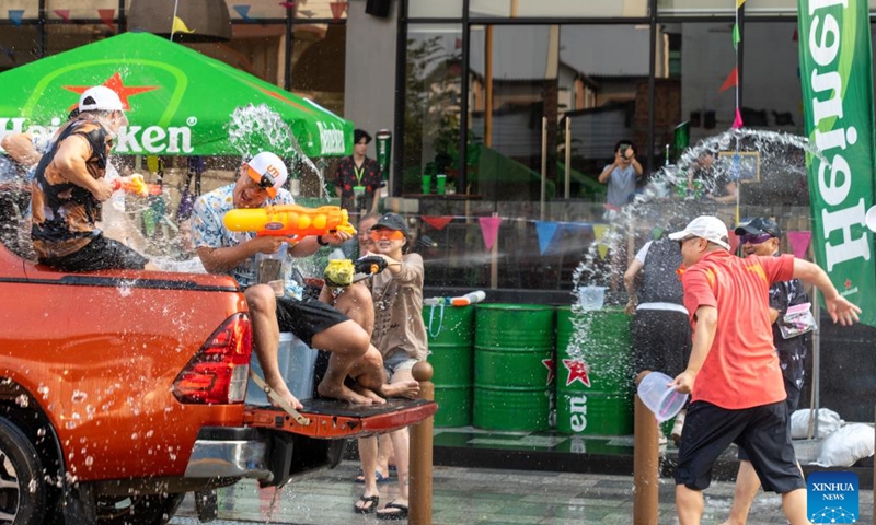 People take part in the celebration of the Lao New Year in Vientiane, Laos, April 14, 2026. (Photo by Kaikeo Saiyasane/Xinhua)

