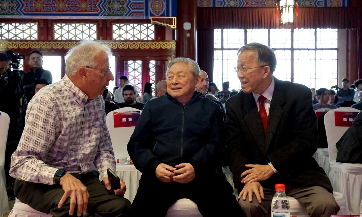 Former US table tennis player Dell Sweeris (left), honorary president of the International Table Tennis Federation Xu Yinsheng (middle), and former US table tennis player Yao Zhenxu have a chat at a commemoration marking the 55th anniversary of the ping-pong diplomacy in Shanghai on April 13, 2026. Photo: Chen Xia/GT