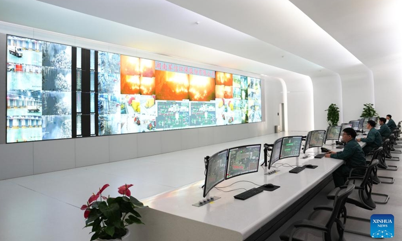 Staff members monitor the operation of facilities at the central control room of the Heimifeng environmental protection park in Changsha City, central China's Hunan Province on April 22, 2026.

