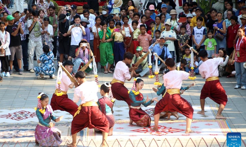 Artists perform during the celebrations of the Cambodian New Year at the Wat Phnom historical site in Phnom Penh, Cambodia on April 14, 2026. (Photo by Sovannara/Xinhua)

