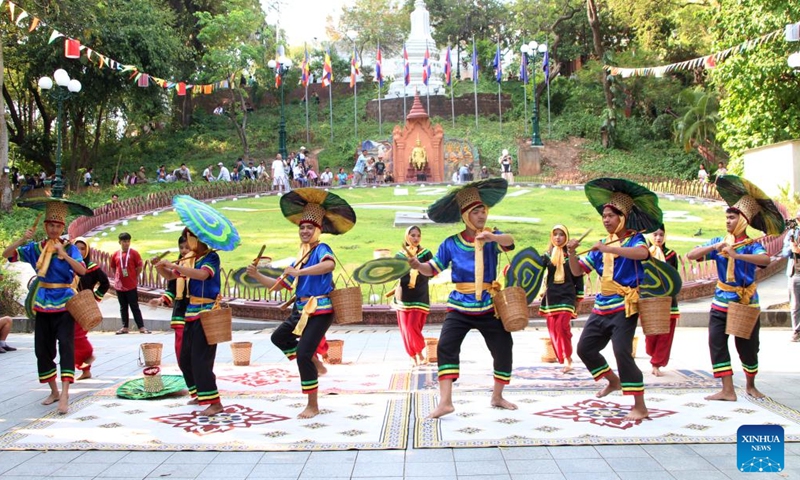 Artists perform during the celebrations of the Cambodian New Year at the Wat Phnom historical site in Phnom Penh, Cambodia on April 14, 2026. (Photo by Sovannara/Xinhua)


