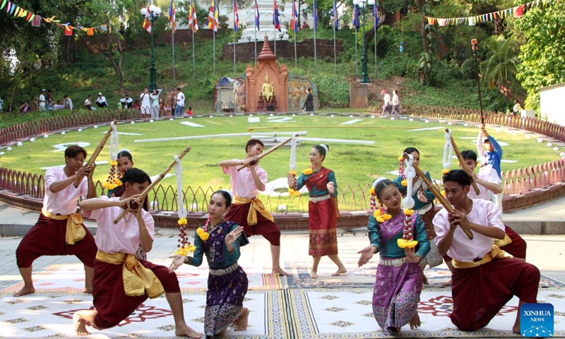 Artists perform during the celebrations of the Cambodian New Year at the Wat Phnom historical site in Phnom Penh, Cambodia on April 14, 2026. (Photo by Sovannara/Xinhua)

