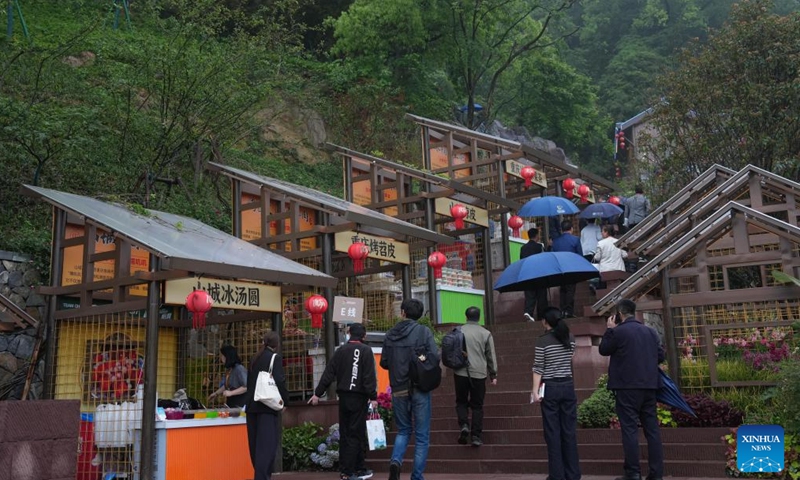 People visit the 15th China International Garden Expo in Wenzhou, east China's Zhejiang Province, April 15, 2026. The 15th China International Garden Expo kicked off here on Wednesday. (Xinhua/Huang Zongzhi)

