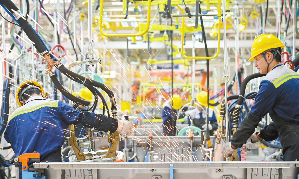 Workers of the Guizhou Changjiang Automobile Co in Gui'an New District, Guiyang of South West China's Guizhou Province, work to produce electric trucks to fulfill orders, on April 16, 2026. Photo: VCG