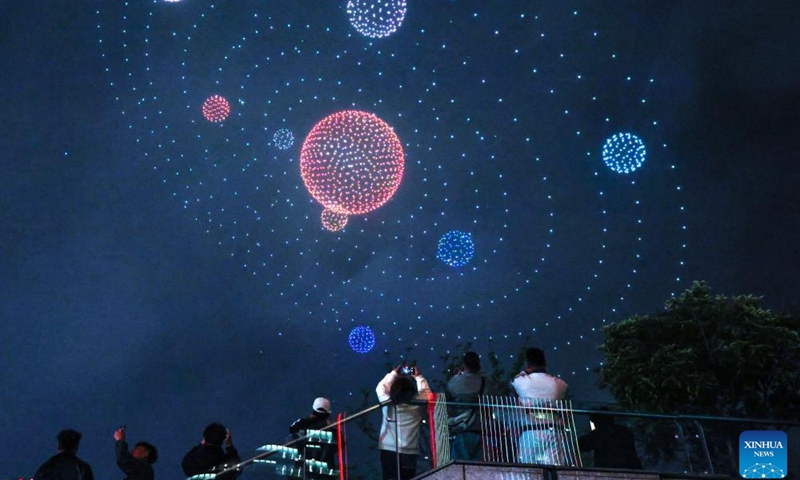 People watch a drone light show at Guanshanhu District in Guiyang, southwest China's Guizhou Province, April 14, 2026. A drone light show was staged in Guiyang on Tuesday, showcasing the city's booming big data industry and rich cultural and tourism resources. (Xinhua/Yang Wenbin)

