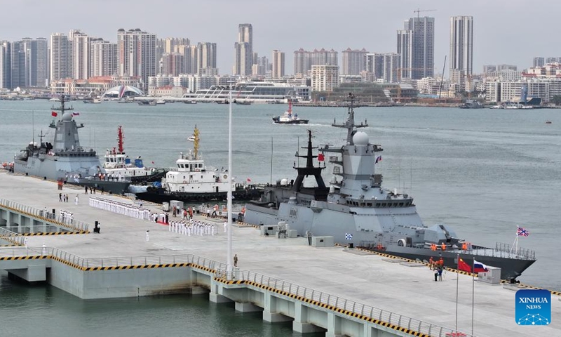 A drone photo taken on April 15, 2026 shows vessels of a Russian navy fleet at a military port in Zhanjiang, south China's Guangdong Province. A Russian navy fleet consisting of two frigates and a medium-sized replenishment ship arrived in south China's Guangdong Province on Wednesday for a five-day friendly visit. The Russian fleet, flying the flags of both Russia and China, docked on Wednesday morning at a military port in Zhanjiang, where the Chinese side held a welcome ceremony. (Photo by Huo Yangke/Xinhua)

