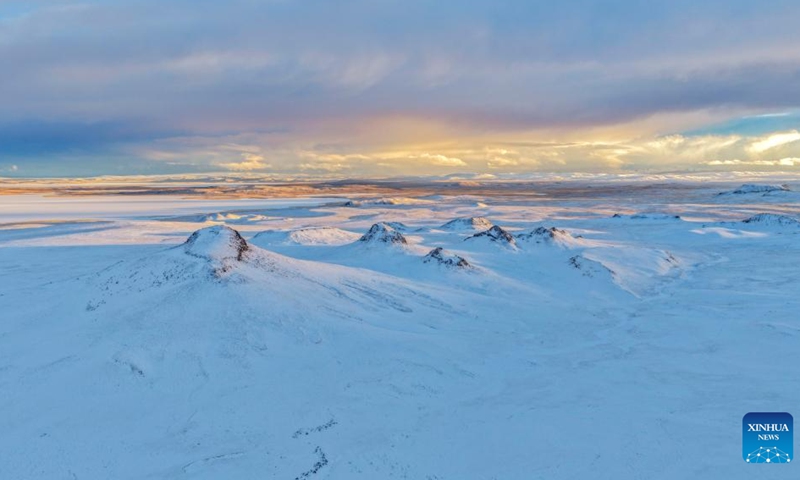 An aerial drone photo taken on April 9, 2026 shows a view pictured at the Bamoqongzong extinct volcanic cluster area in the Changtang National Nature Reserve, southwest China's Xizang Autonomous Region. The Bamoqongzong extinct volcanic cluster is located deep within the Changtang National Nature Reserve, at an average elevation of approximately 5,000 meters. (Photo by Liang Chunning/Xinhua)

