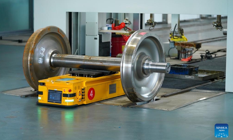 An automated assembly line equipped with AI recognition system conducts maintenance operations at a workshop of China Railway Harbin Bureau Group Co., Ltd. in Harbin, northeast China's Heilongjiang Province, April 15, 2026.

