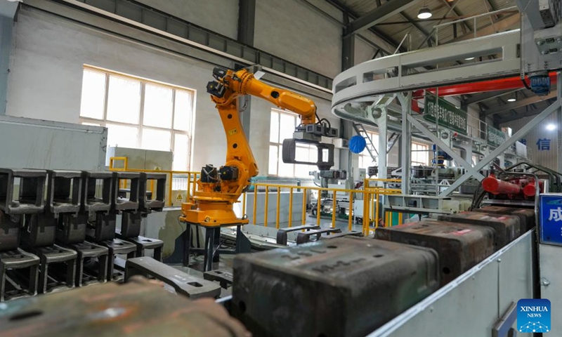 A robot conducts maintenance work at a workshop of China Railway Harbin Bureau Group Co., Ltd. in Harbin, northeast China's Heilongjiang Province, April 15, 2026.

