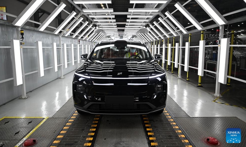 This photo taken on March 23, 2026 shows a production line of Chinese auto brand Jetour at a manufacturing base in Kaifeng, central China's Henan Province.

