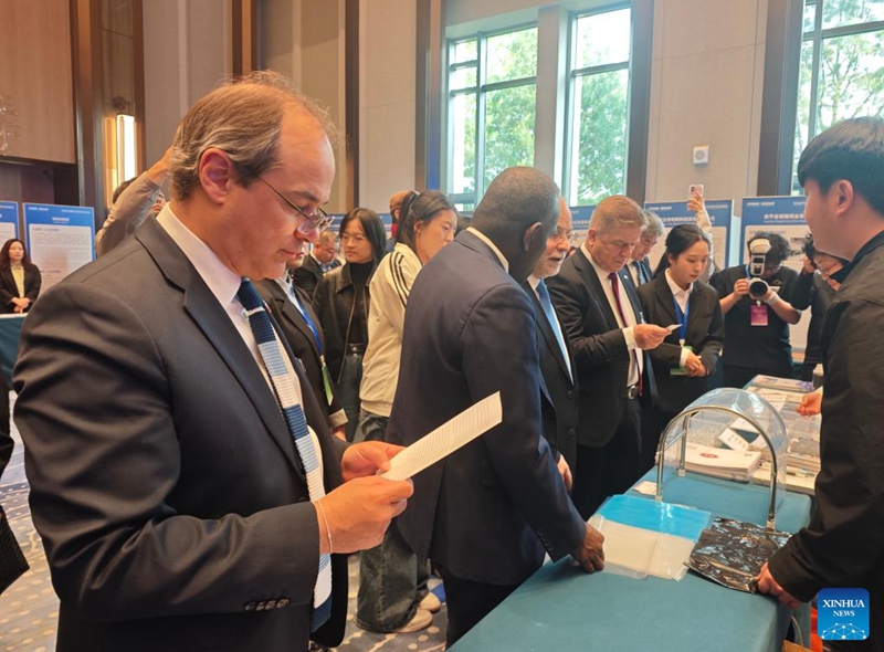 Foreign envoys learn about Hebei's specialized industrial clusters at a business matching event in Shijiazhuang, north China's Hebei Province, April 14, 2026. A group of ambassadors, representatives and senior diplomats from 24 countries and international organizations, including Argentina, Jordan and Slovakia, visited north China's Hebei Province from April 14 to 16 at the invitation of the Ministry of Foreign Affairs. The tour focused on the region's industrial innovation, traditional culture and urban development. (Xinhua/Dong Xiaokun)