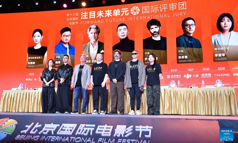 Members of the Forward Future International Jury of the 16th Beijing International Film Festival (BJIFF) pose during the 16th BJIFF Jury Press Conference in Beijing, capital of China, April 18, 2026. (Xinhua/Xiao Xiao)