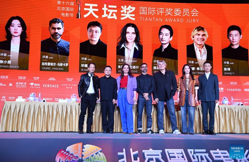 Members of the Tiantan Award Jury of the 16th Beijing International Film Festival (BJIFF) pose during the 16th BJIFF Jury Press Conference in Beijing, capital of China, April 18, 2026. (Xinhua/Xiao Xiao)