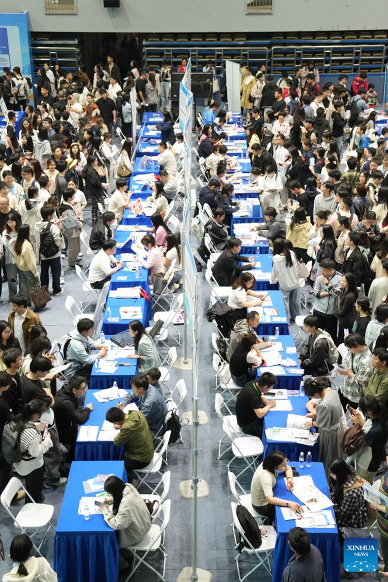 This photo taken on April 18, 2026 shows a scene at a job fair held at Hunan University in Changsha, central China's Hunan Province. The two-day job fair for university graduates kicked off on Saturday, with the main venues in Hunan University and Hunan Normal University. (Xinhua/Chen Zhenhai)