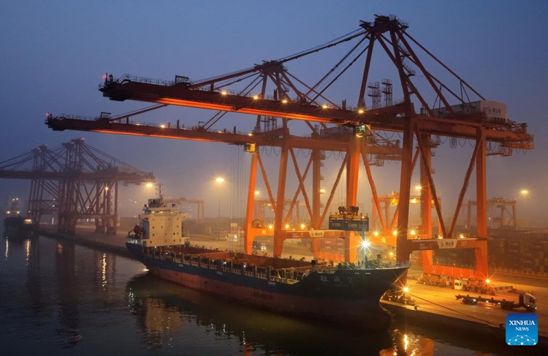 A drone photo taken on April 18, 2026 shows a vessel loading containers at a container terminal of the Jingtang area of Tangshan Port in Tangshan, north China's Hebei Province.

According to the authorities, the cargo throughput of Tangshan Port reached 215.48 million tonnes in the first quarter of 2026, up 3.67 percent year-on-year. Photo: Xinhua