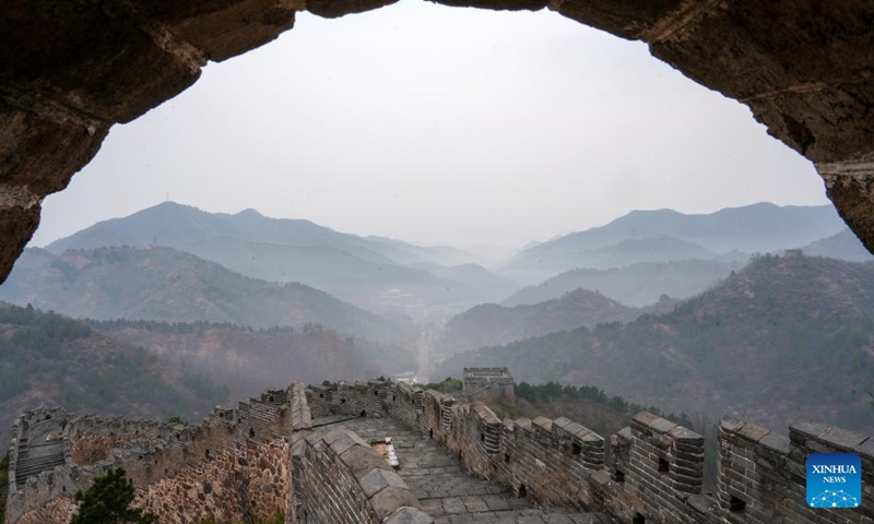 This photo taken on April 15, 2026 shows a view of the Jinshanling section of the Great Wall after rain in Luanping County of Chengde, north China's Hebei Province. (Photo by Zhou Wanping/Xinhua)