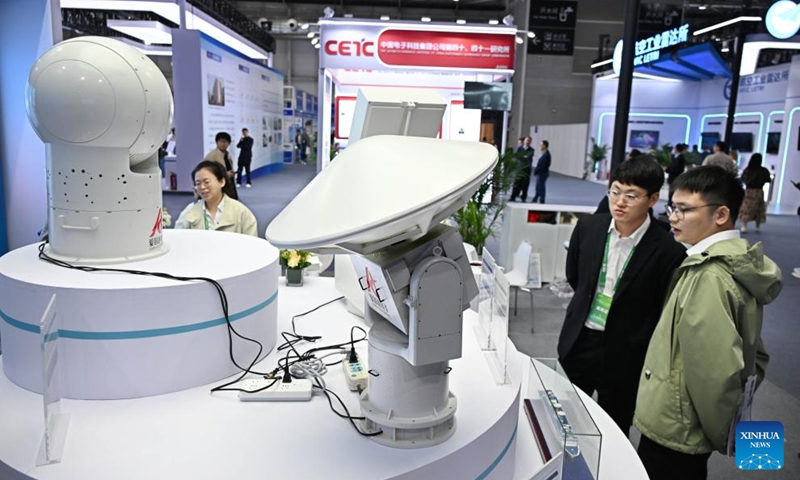 People visit the 6th Radar Future Conference in Qingdao, east China's Shandong Province, on April 18, 2026. The conference opened here on Saturday and will run till April 20, showcasing the latest radar-related technologies and products. (Xinhua/Li Ziheng)