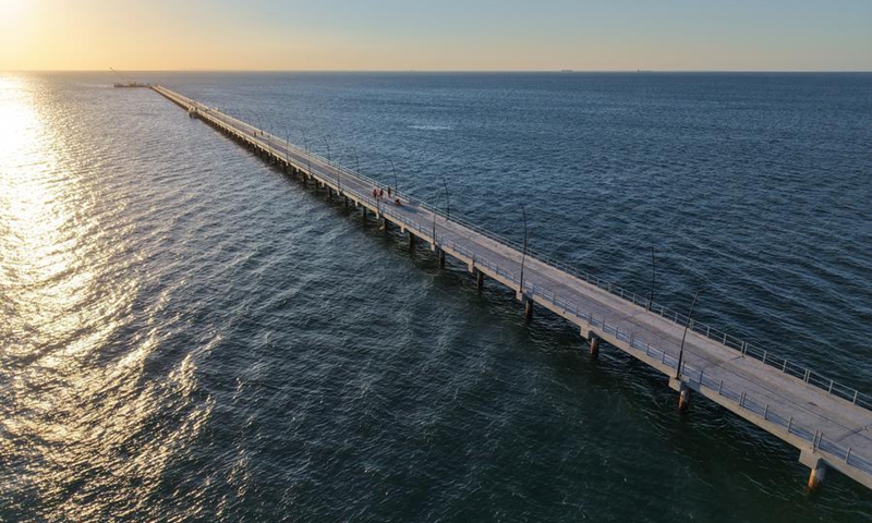 An aerial drone photo taken on Feb. 21, 2026 shows the jetty bridge built by China Road and Bridge Corporation on Inhaca Island in Maputo Bay, Mozambique. (China Road and Bridge Corporation/Handout via Xinhua)