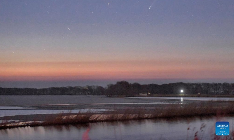 This photo taken on April 18, 2026 shows the comet C/2025 R3 in the sky over Qiqihar City, northeast China's Heilongjiang Province. (Photo by Wang Yonggang/Xinhua)

