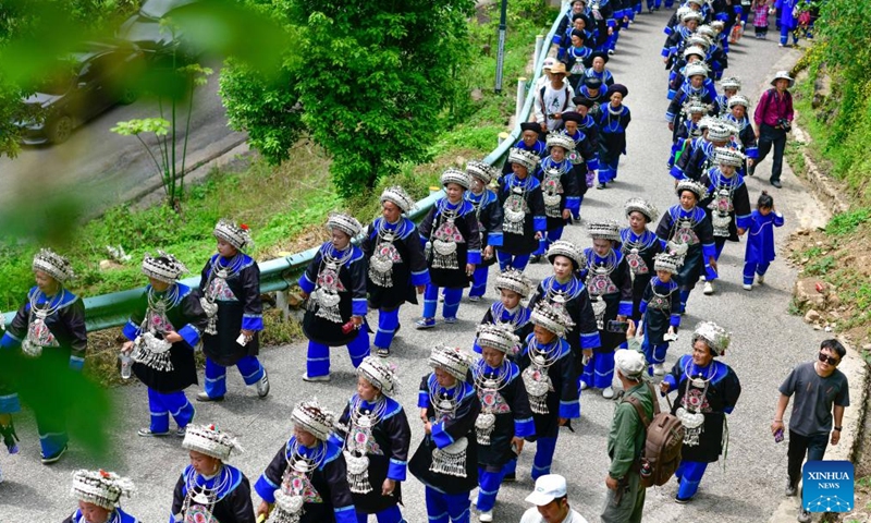 People of the Dong ethnic group participate in an event celebrating the Sanyuesan Festival at Zhenyuan County in southwest China's Guizhou Province, April 19, 2026. The Sanyuesan Festival is a traditional festival celebrated on the third day of the third lunar month by various ethnic groups in China. The festival falls on April 19 this year. (Xinhua/Yang Wenbin)

