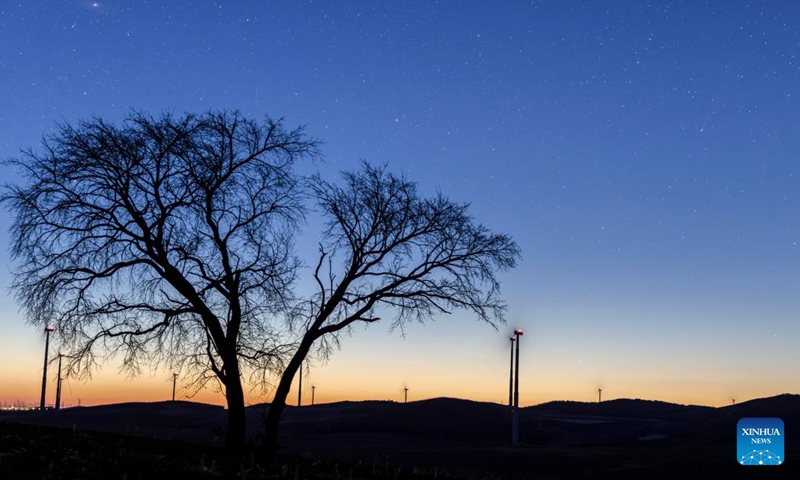 This photo taken on April 14, 2026 shows the comet C/2025 R3 in the sky over Shuangyashan City, northeast China's Heilongjiang Province. (Photo by Han Yang/Xinhua)

