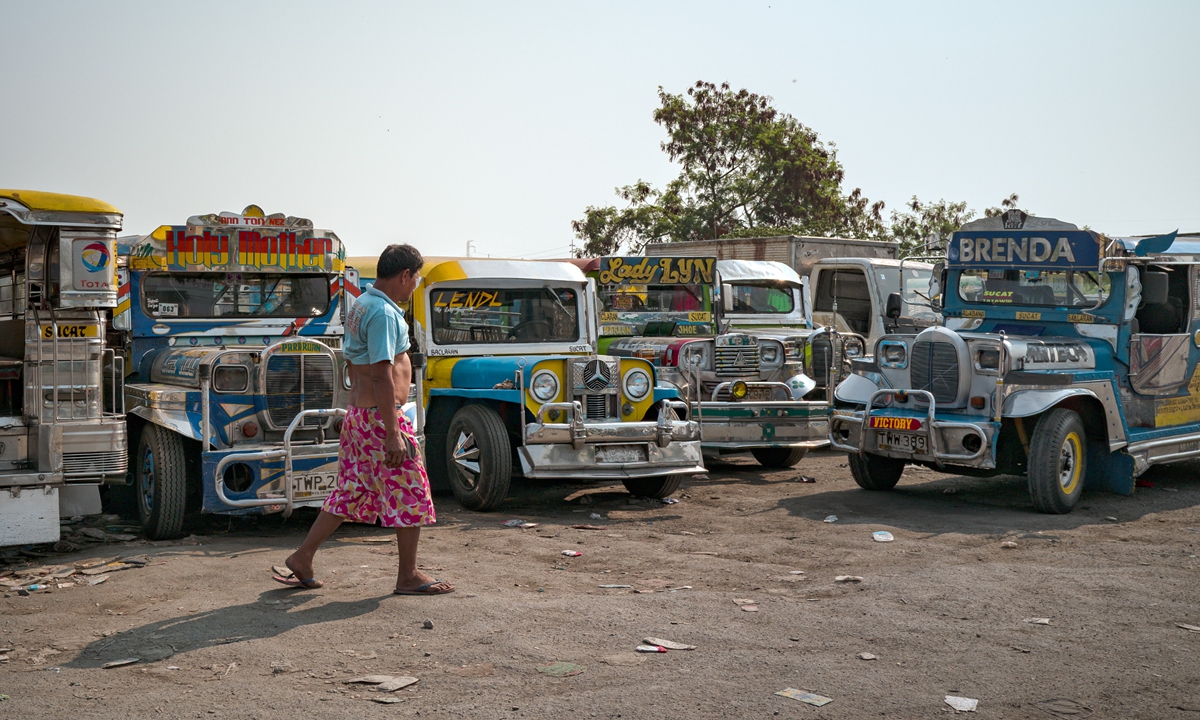 Jeepneys sit idle in a yard as drivers stop working due to rising fuel costs on April 19, 2026 in Muntinlupa, Metro Manila, the Philippines. Many jeepney drivers have been affected due to rising oil prices driven by geopolitical tensions in the Middle East, according to media reports. Photo: VCG