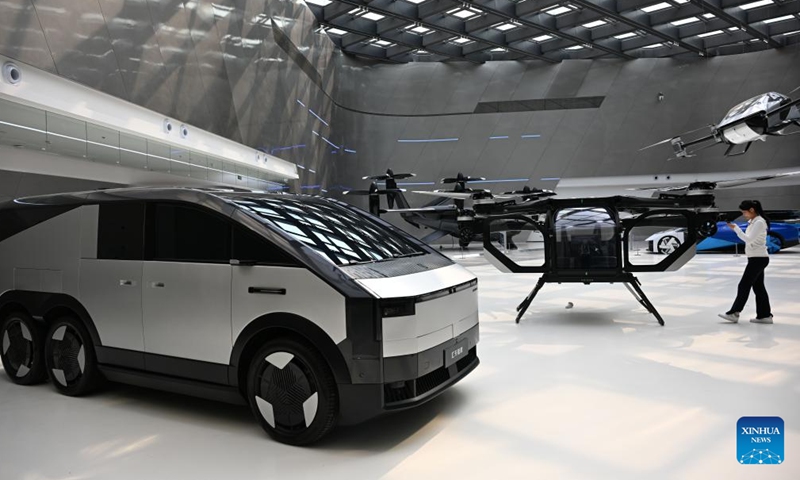 This photo taken on April 13, 2026 shows a Land Aircraft Carrier, developed by ARIDGE, a pioneering developer of low-altitude mobility solutions, displayed at Xpeng Technology Park in Tianhe District of Guangzhou, south China's Guangdong Province.

