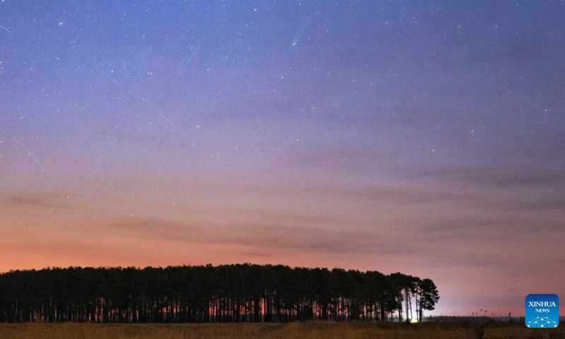 This photo taken on April 15, 2026 shows the comet C/2025 R3 in the sky over Fujin City, northeast China's Heilongjiang Province. (Photo by Geng Xiqing/Xinhua)

