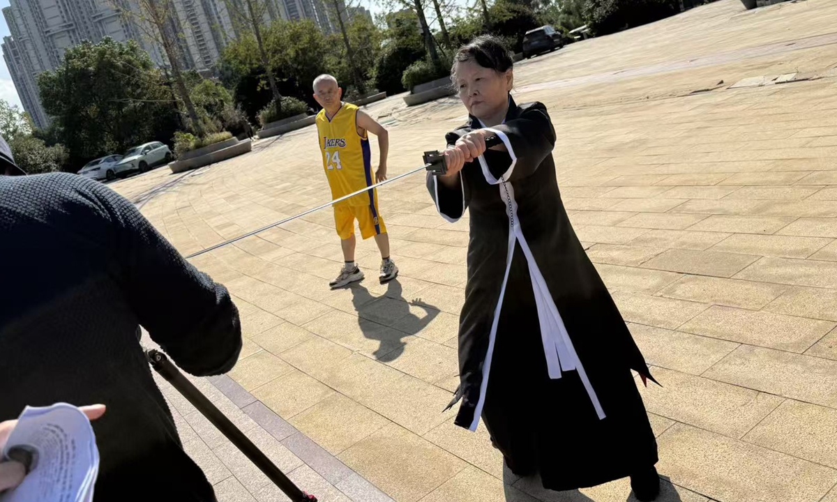 Actors play moves of animation characters during the shooting of Xie's team's special effects video. Photo: Courtesy of Xie