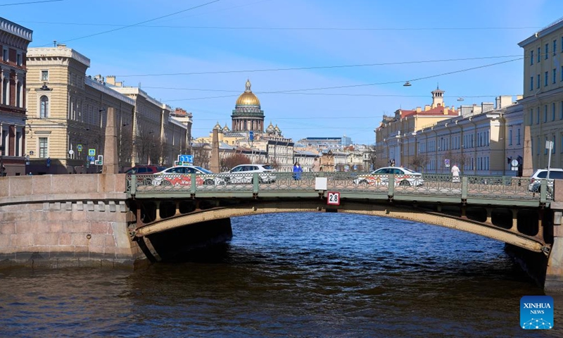 This photo taken on April 19, 2026 shows the scenery of the Moika River in St. Petersburg, Russia. St. Petersburg features a dense network of waterways and over 300 bridges crisscrossing the city. (Photo by Guo Feizhou/Xinhua)

