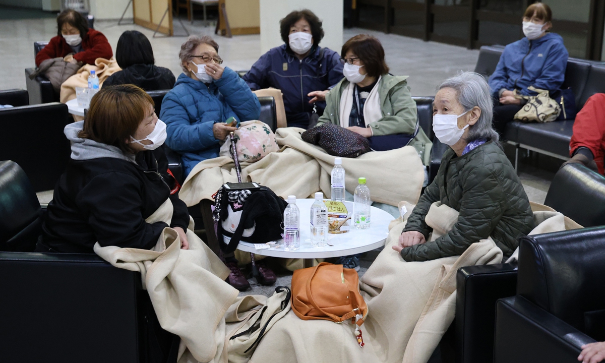 Local residents evacuate to a community center after a tsunami warning was issued following an earthquake off the Sanriku coast on Friday April 20, 2026. Photo: VCG