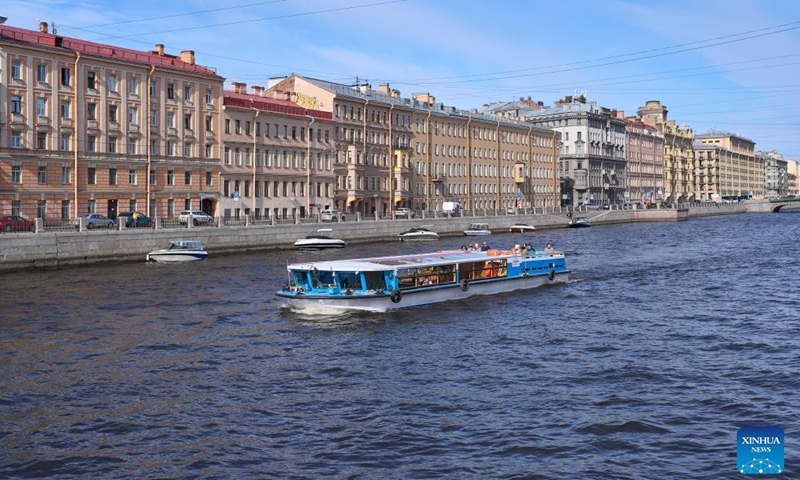 A sightseeing boat travels on the Fontanka River in St. Petersburg, Russia, April 19, 2026. St. Petersburg features a dense network of waterways and over 300 bridges crisscrossing the city. (Photo by Guo Feizhou/Xinhua)


