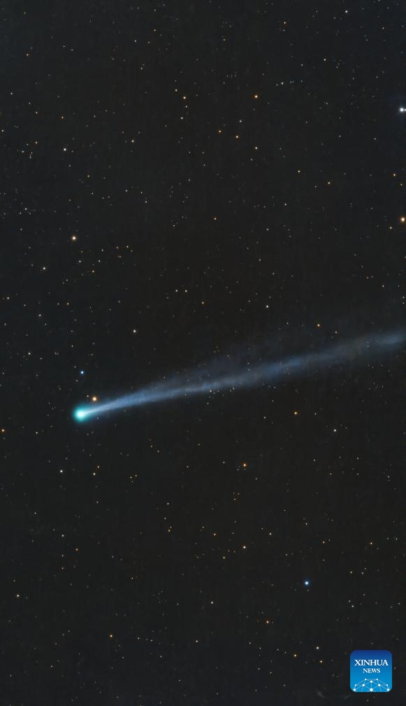 This stack composite photo taken with an intelligent astronomical telescope shows the comet C/2025 R3 in the sky over Yichun City, northeast China's Heilongjiang Province on April 12, 2026. (Photo by Li Jiaxing/Xinhua)

