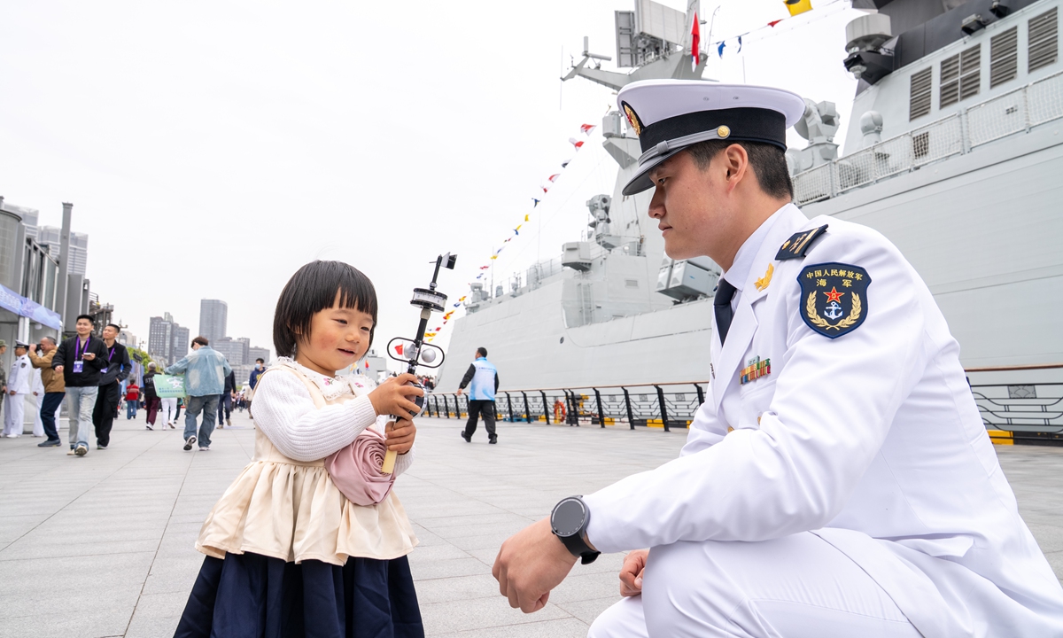 Shanghai residents visit a Chinese People's Liberation Army (PLA) Navy open-ship event at Shanghai Port International Cruise Terminal by the Huangpu River, Shanghai, on April 21, 2026. The PLA Navy is holding a series of open-ship events in several Chinese cities to mark its 77th founding anniversary on April 23. Photo: VCG