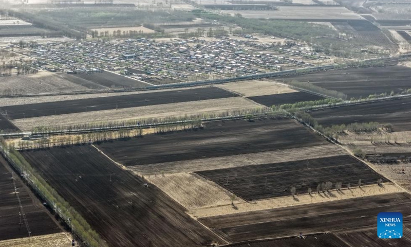 An aerial drone photo taken on April 17, 2026 shows farmland to be sown in Horqin Left Wing Middle Banner of Tongliao City, north China's Inner Mongolia Autonomous Region. The ploughing work in Tongliao, a granary of eastern Inner Mongolia, is drawing to a close ahead of the peak period of corn sowing. It is learned that Tongliao's corn planting area in 2026 is expected to reach 20 million mu (1.33 million hectares). (Xinhua/Lian Zhen)

